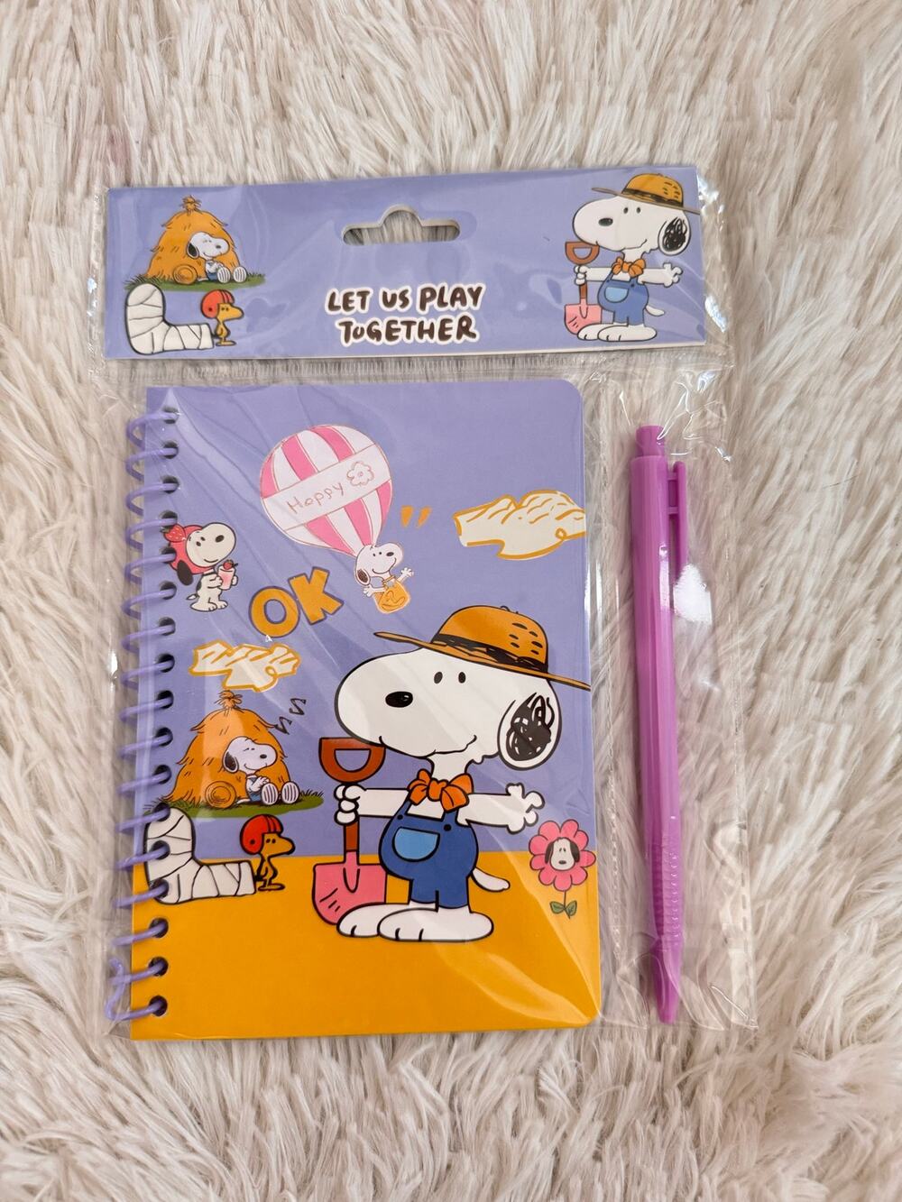 Snoopy spiral notebook and pen set with Snoopy in a hat and overalls size A6